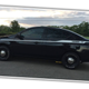 Image for article titled This Hilarious Customized Nissan Versa Has A Ridiculous Mod I've Never Seen Before